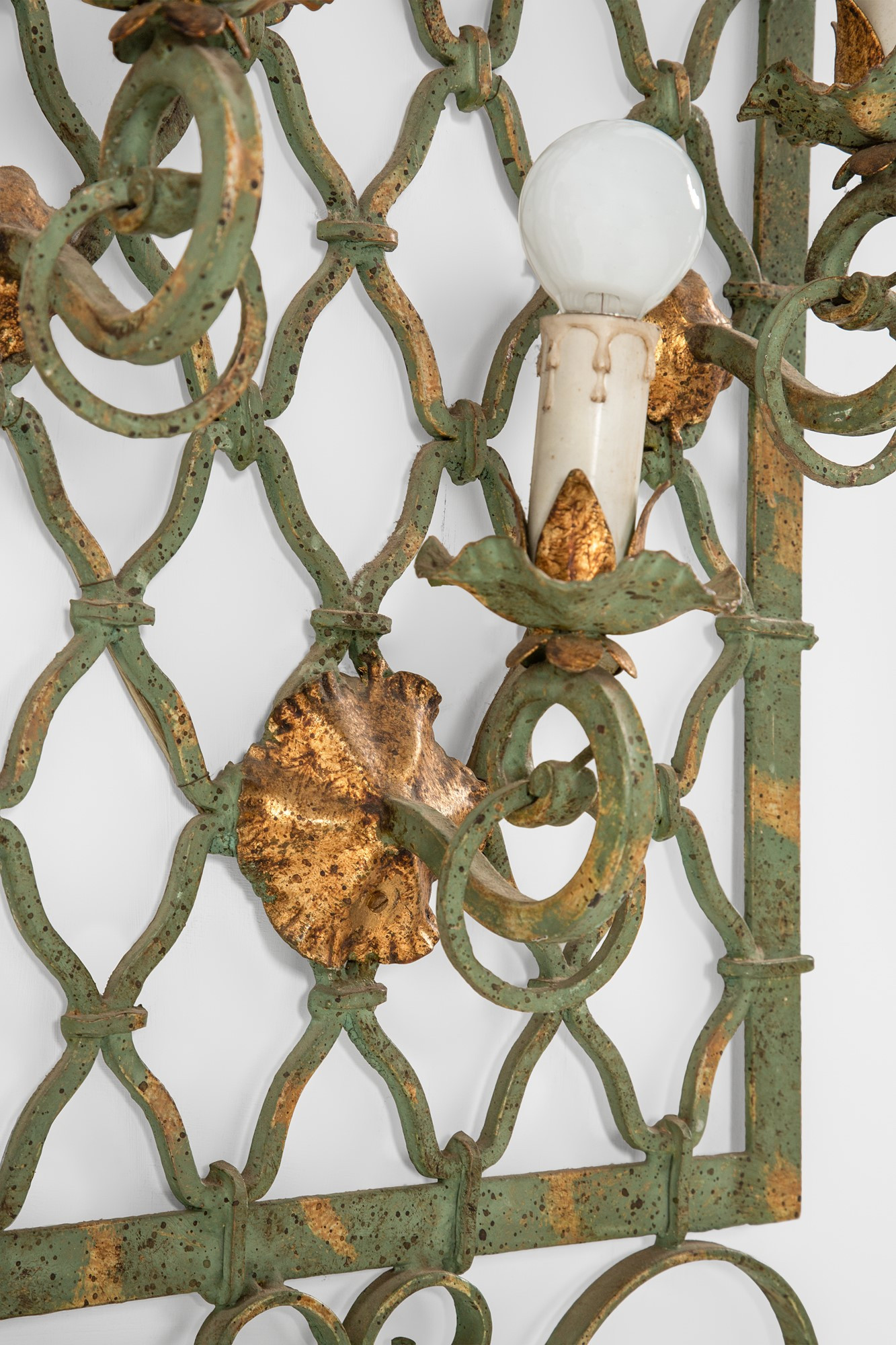 Late 1950s Pair of Wall Lights in Wrought Iron in the Style of Gilbert Poillerat