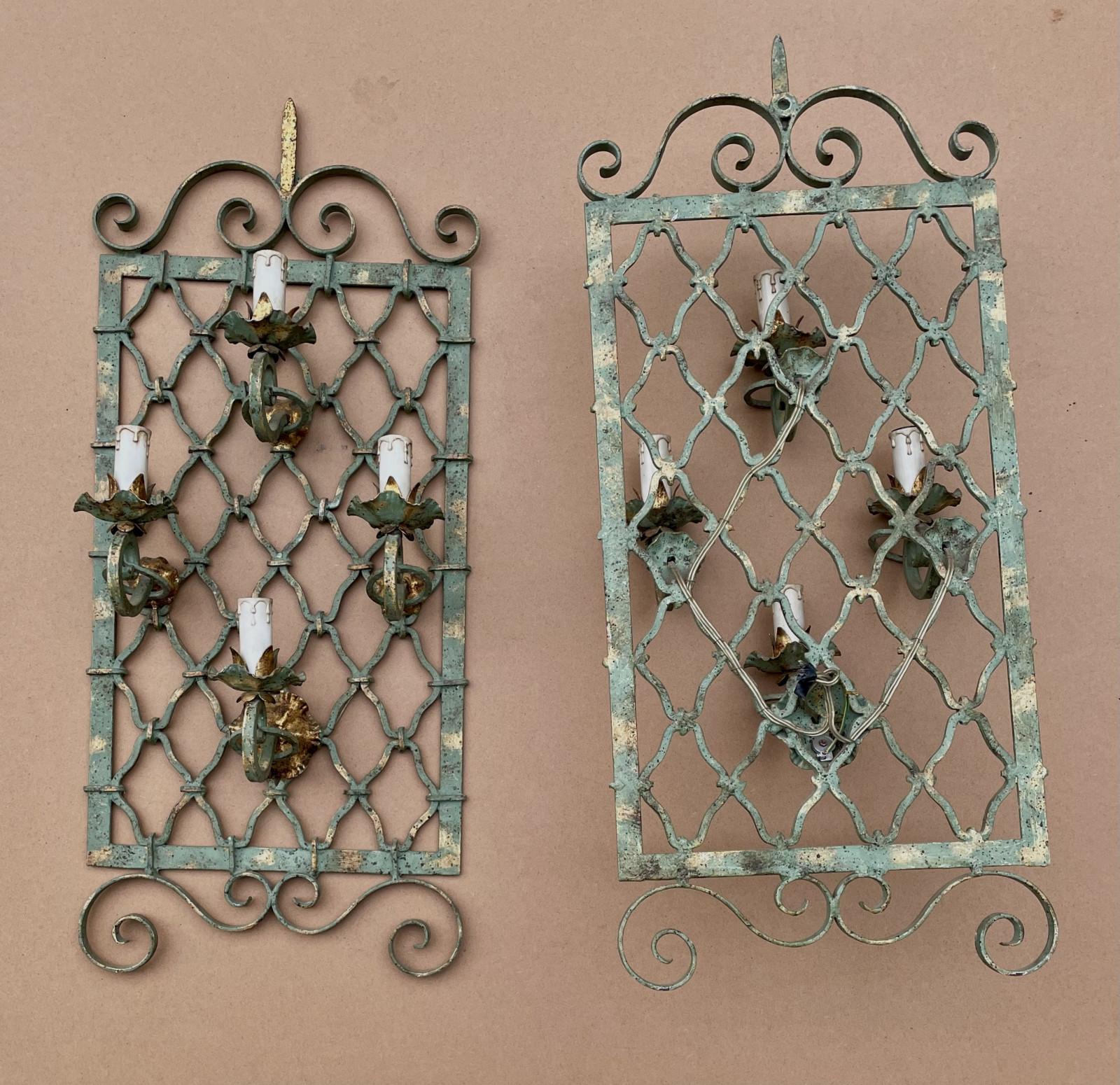 Late 1950s Pair of Wall Lights in Wrought Iron in the Style of Gilbert Poillerat